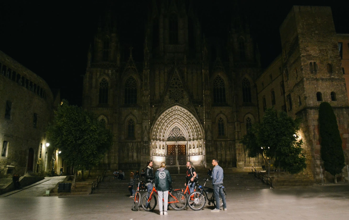 Barcelona Night Bike Tour with Local Tapas and Cava Stop