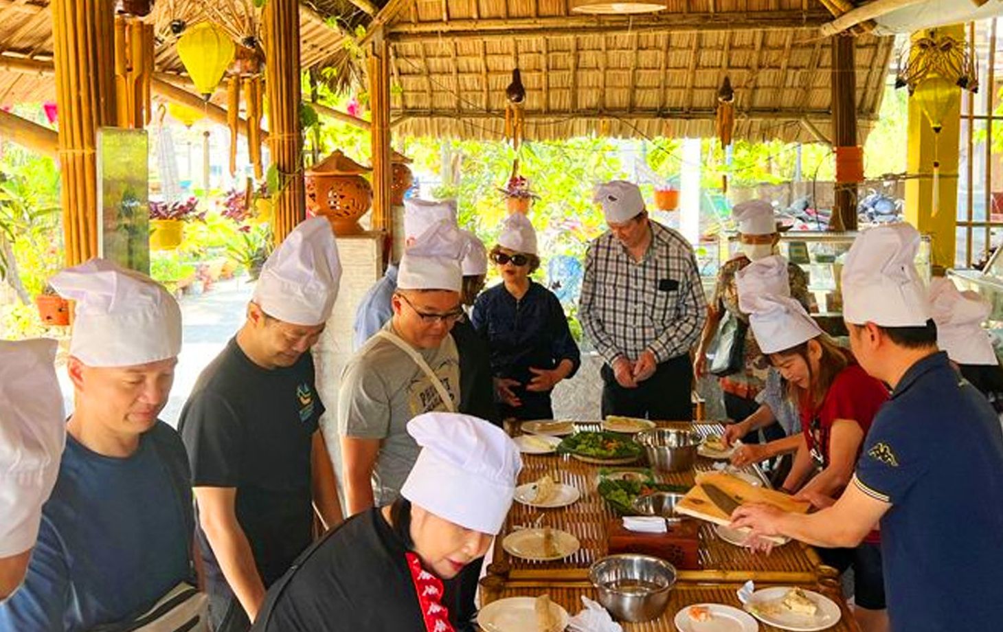 Vietnamese Countryside Experience: Market Tour, Basket Boat Ride, and Cooking Class