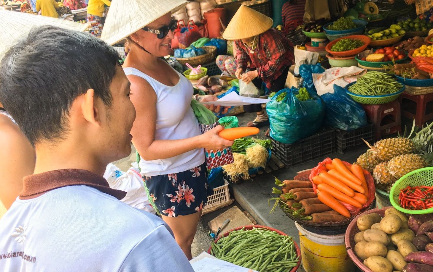 Vietnamese Countryside Experience: Market Tour, Basket Boat Ride, and Cooking Class