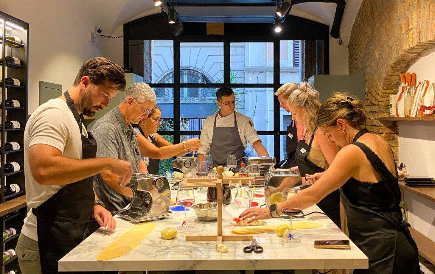 Italian Cooking Masterclass by the Colosseum: Pizza, Pasta & Tiramisu with Wine