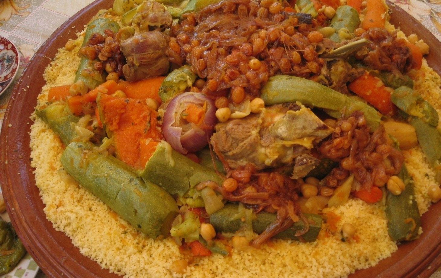 Discover Moroccan Cuisine: Traditional Couscous and Local Souk Tour