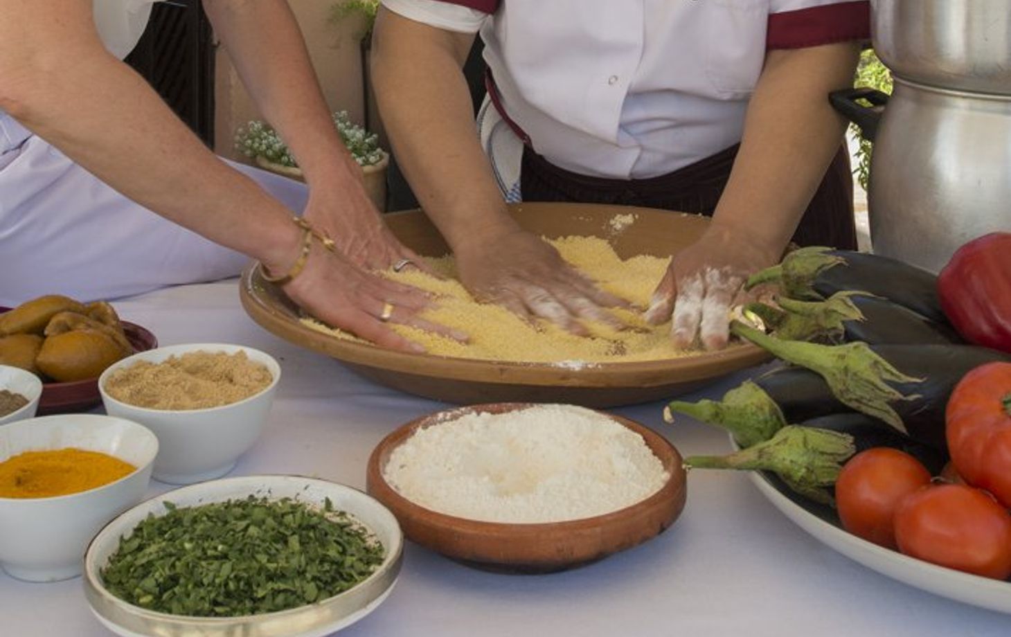 Discover Moroccan Cuisine: Traditional Couscous and Local Souk Tour