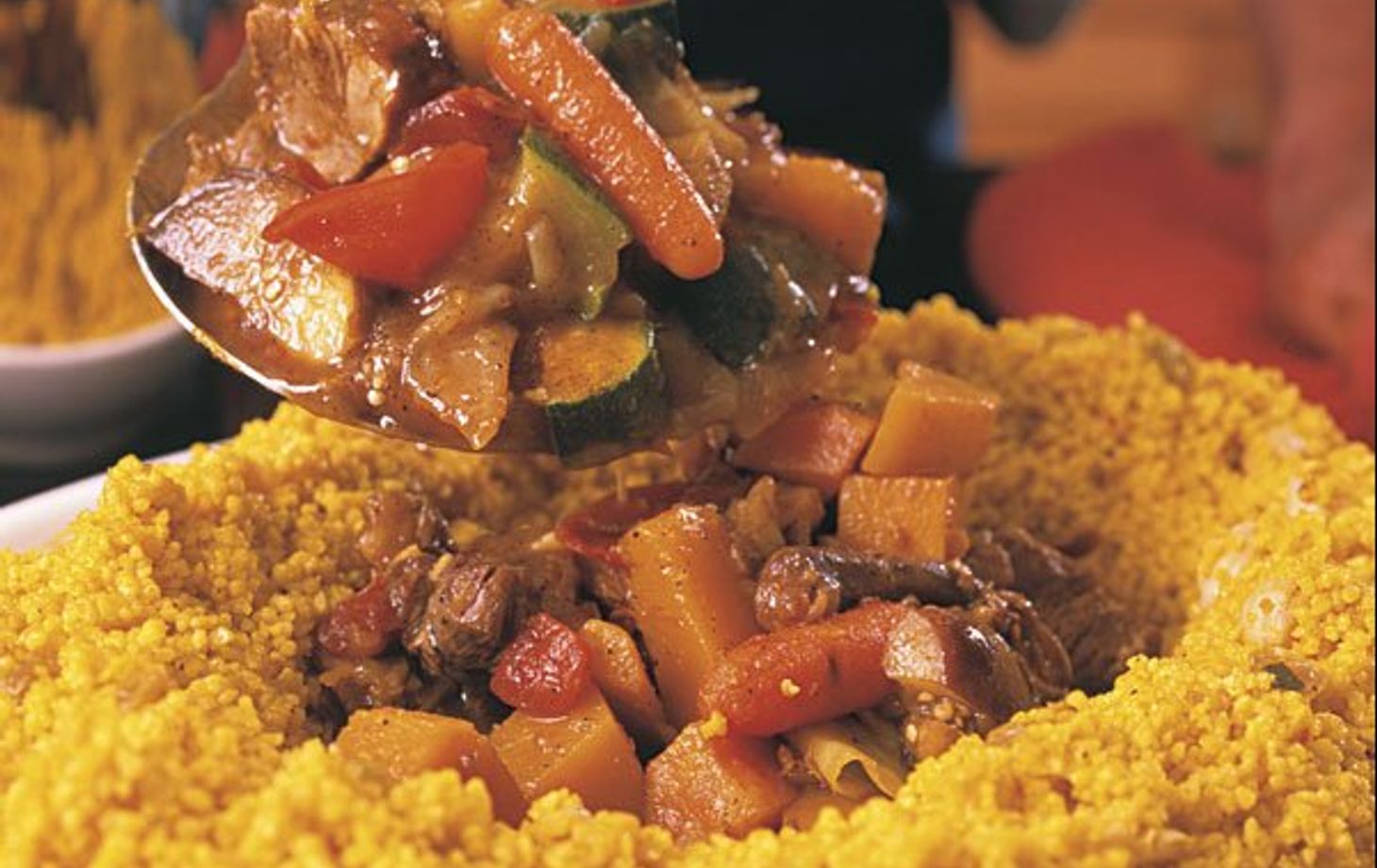 Discover Moroccan Cuisine: Traditional Couscous and Local Souk Tour