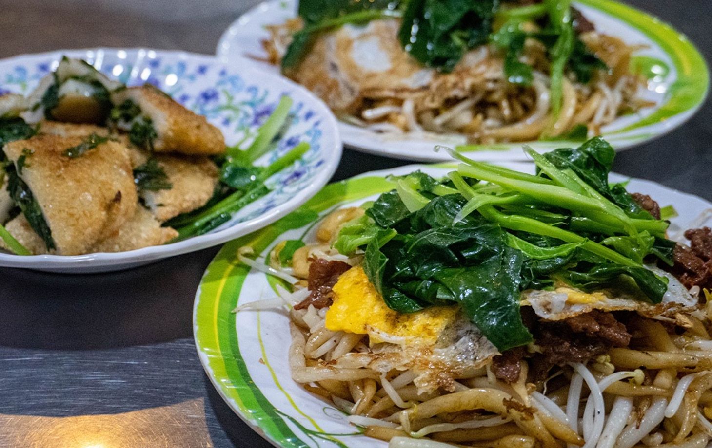 Evening Vespa Street Food Adventure in Phnom Penh