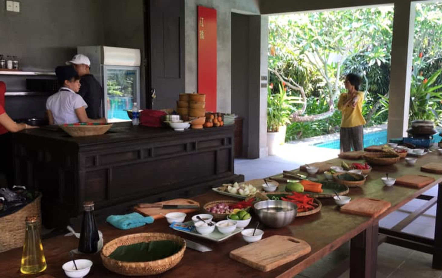 Red Bridge Deluxe Day Journey: Organic Farm, Boat Trip, Market Tour and Hands on Cooking of 4 Famous Vietnamese Dishes