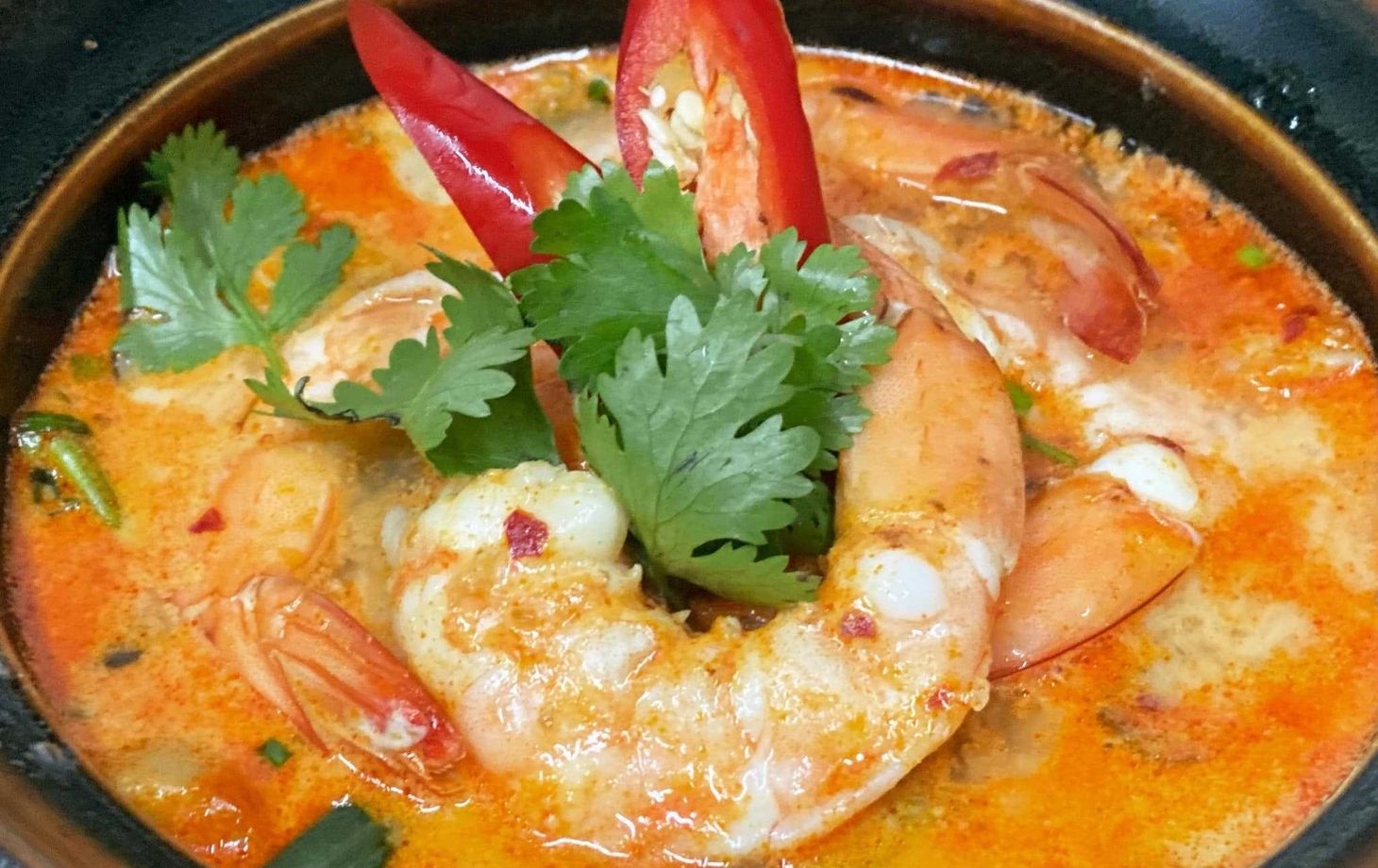 Thai Cooking Class with the Largest Market Visit and Tuk-Tuk Ride Back to School