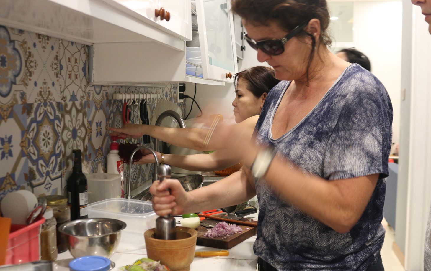 Hands on Cooking Class with Lily & Friends and Explore Local Neighborhoods